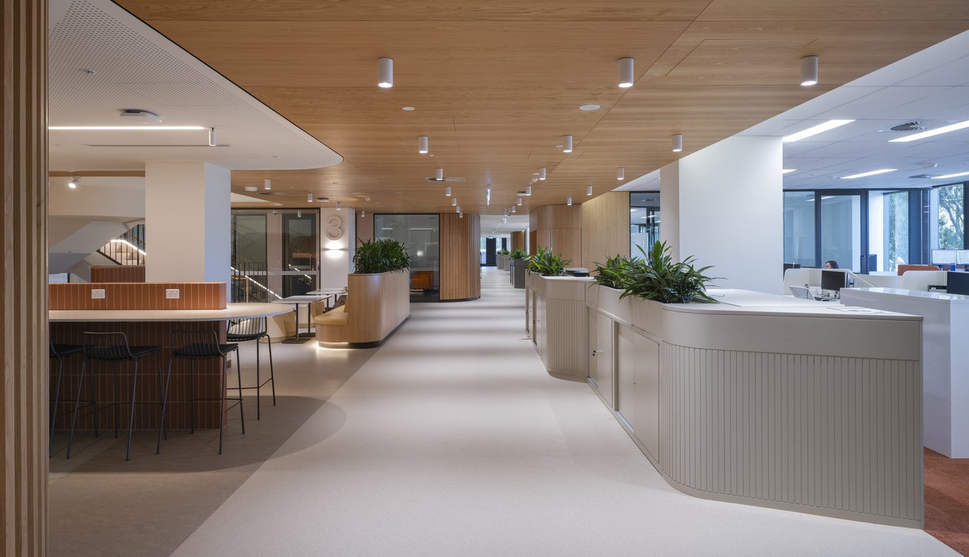 Open-plan research floor at the HMRB Building, lit under a zencontrol DALI system