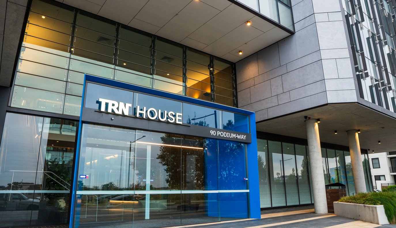 Lit circulation space at TRN House Office Building